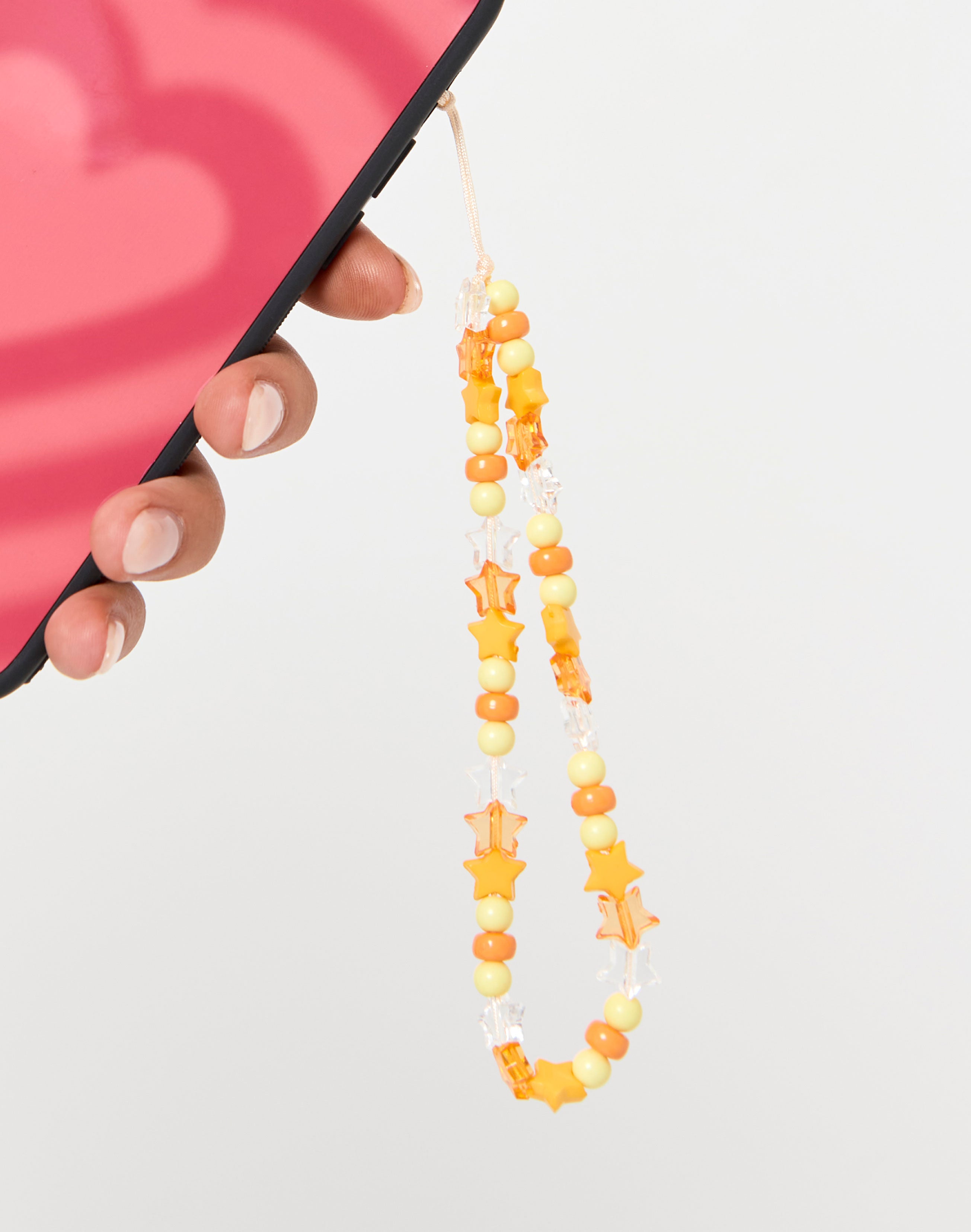 Star Bead Phone Charm in Orange | Glassons