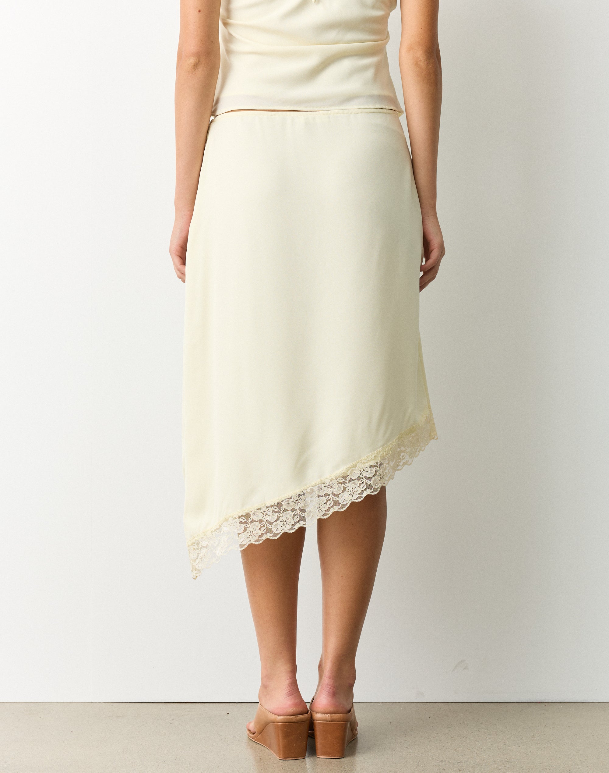 Asymmetrical Lace Trim Midi Skirt in Buttery Bliss | Glassons