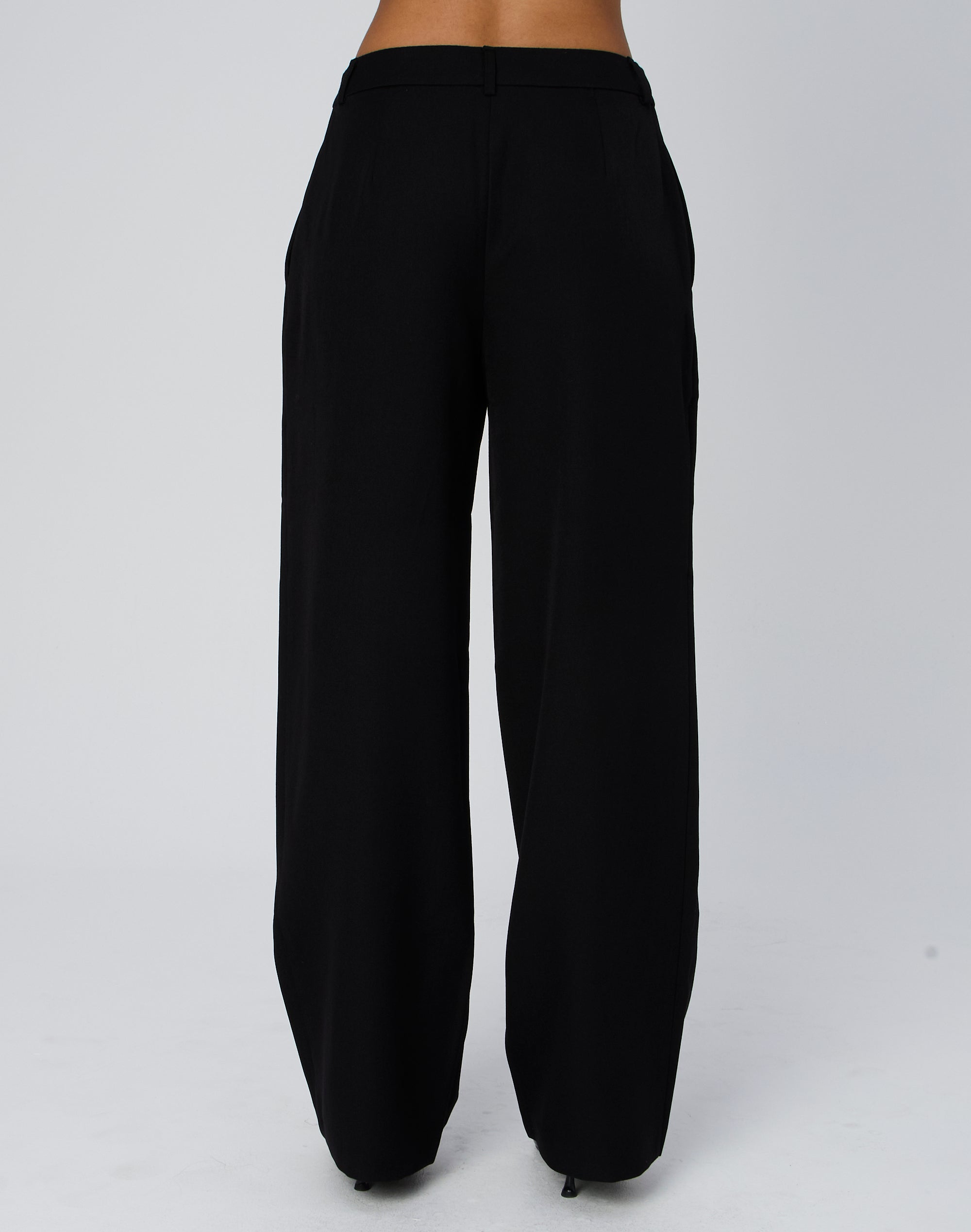 Loose Fit Patterned twill trousers - Black/White checked - Men | H&M IN