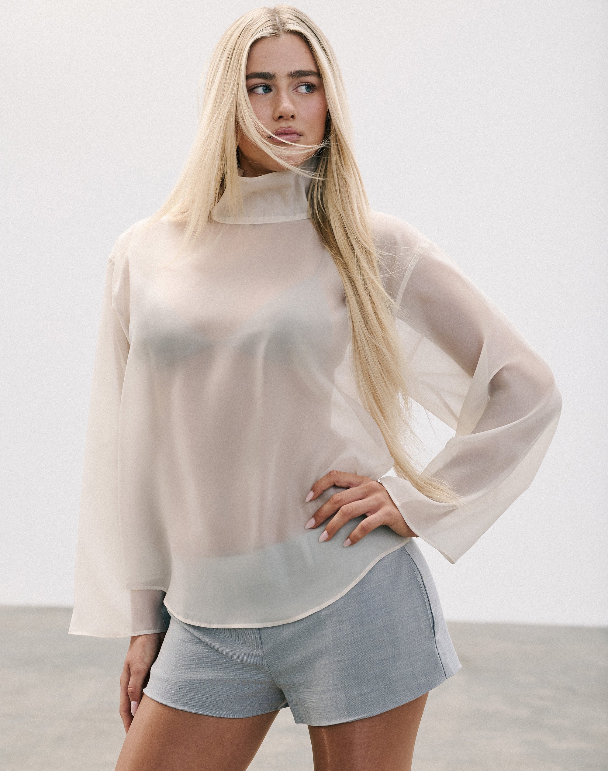 deres デレス　sheer high neck dual blouse Edt. Sheer High Neck Blouse in Sleek Sand | Glassons US