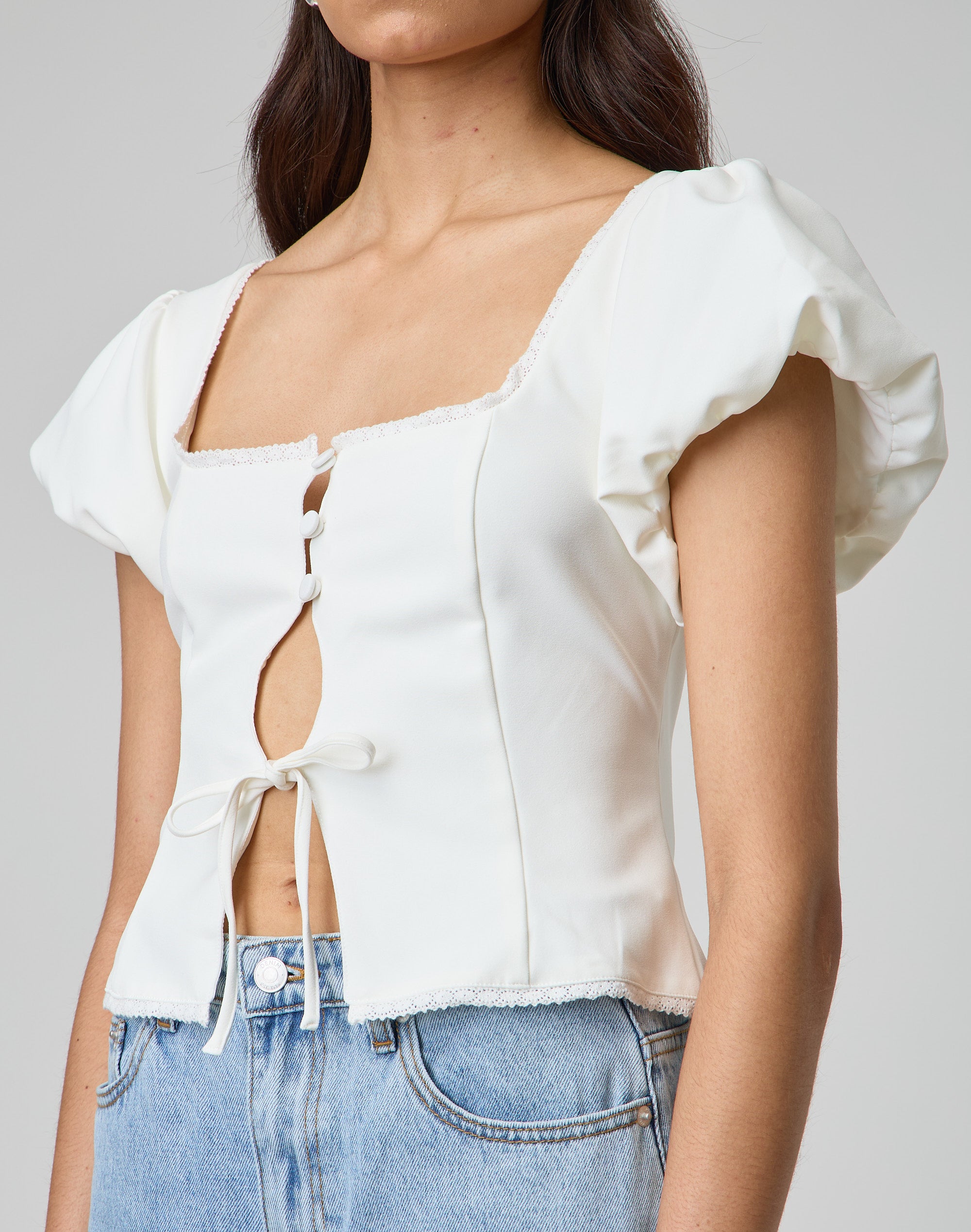 white cut out blouse