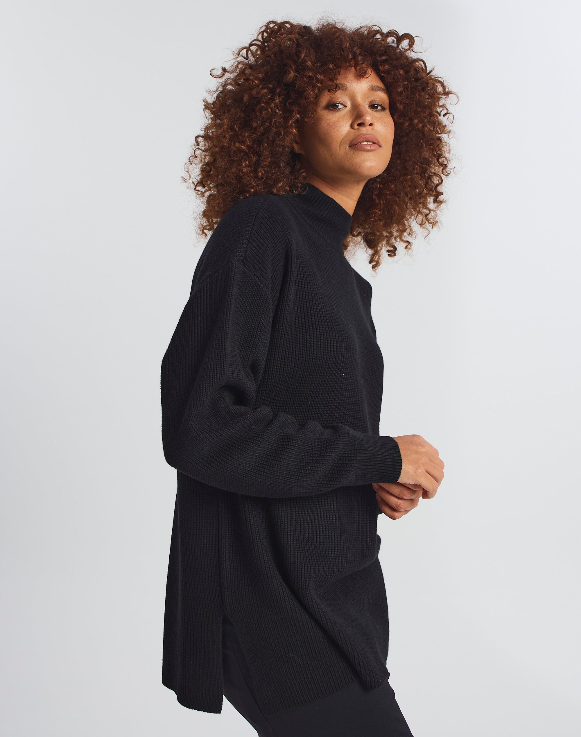 Roll Neck Longline Knitted Jumper in Black | Glassons