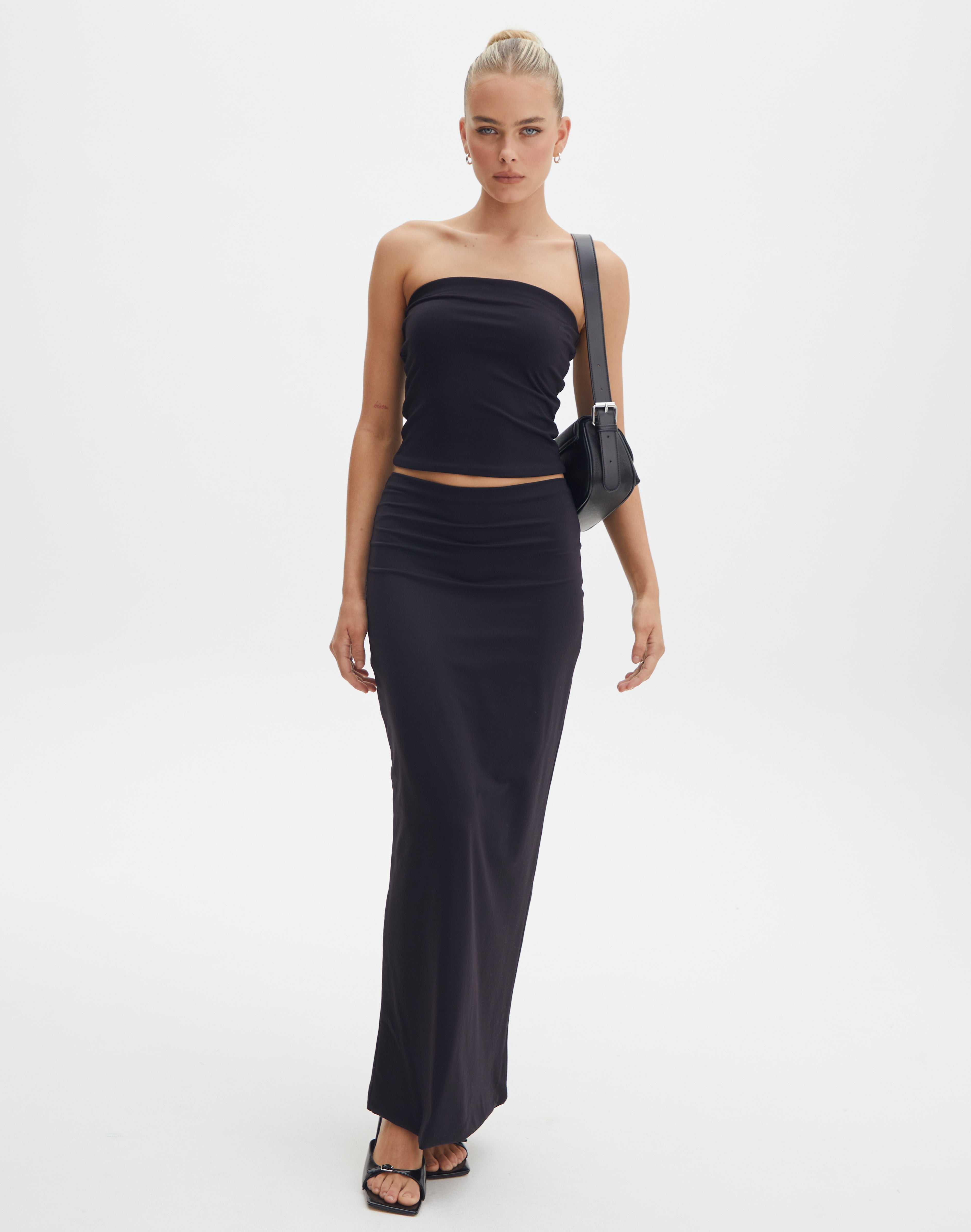 Disrupt Midi Dresses  Buy Disrupt Women Black Back Slit Slim Fit Midi Skirt  Online  Nykaa Fashion