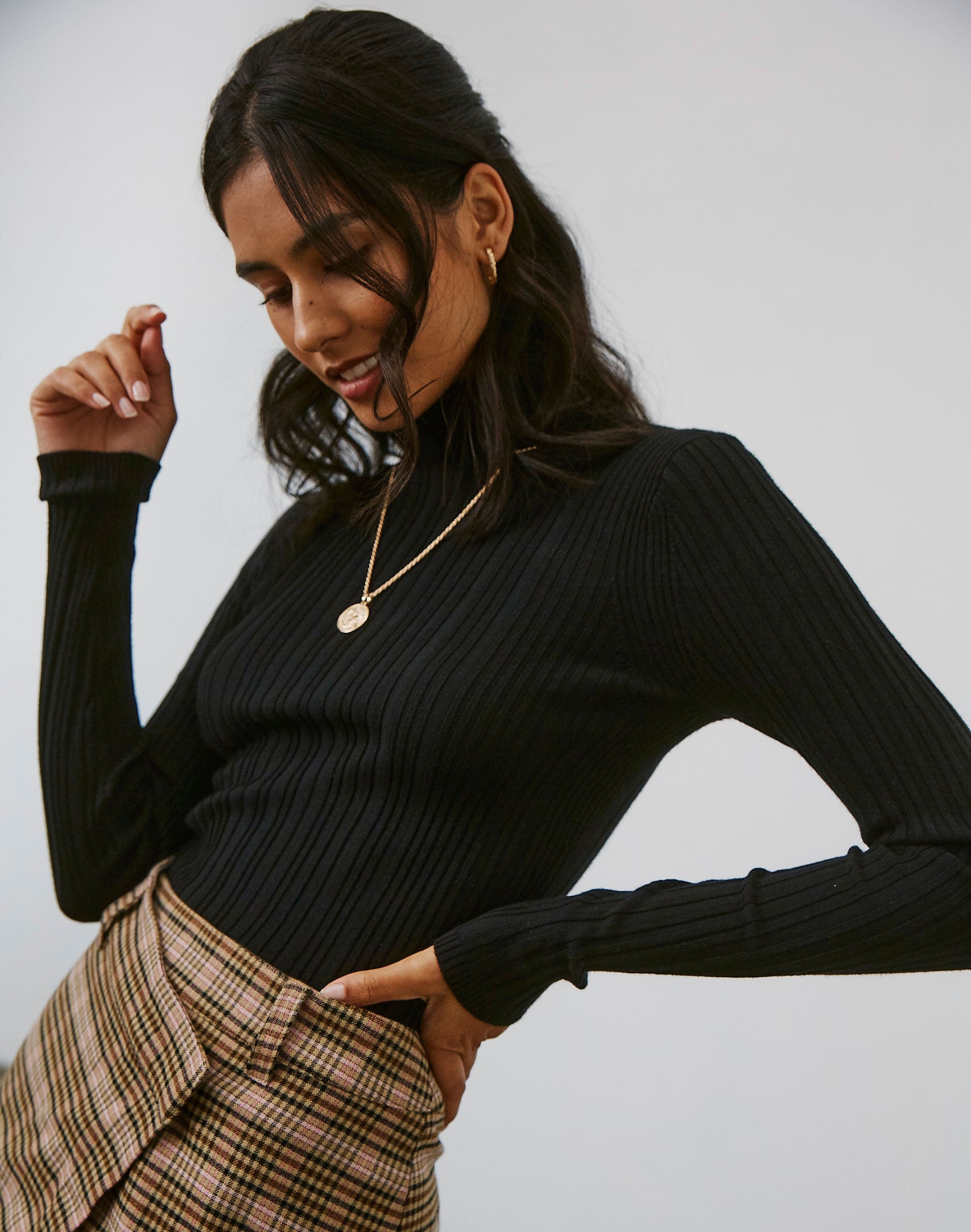 black ribbed polo neck