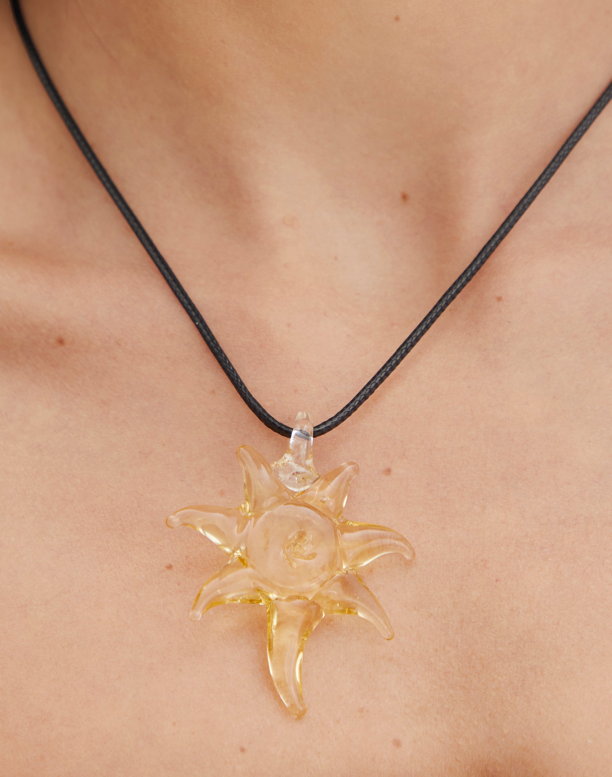 Tangled sun necklace | ShopLook